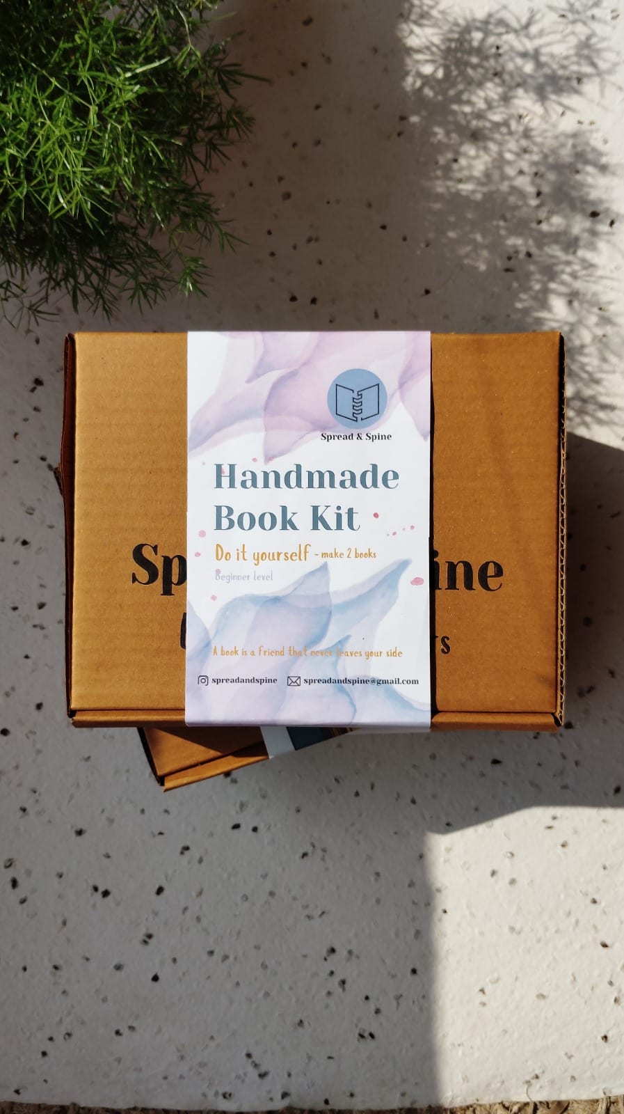 Spread & Spine Handmade Book Kit in kraft packaging — DIY beginner bookbinding set