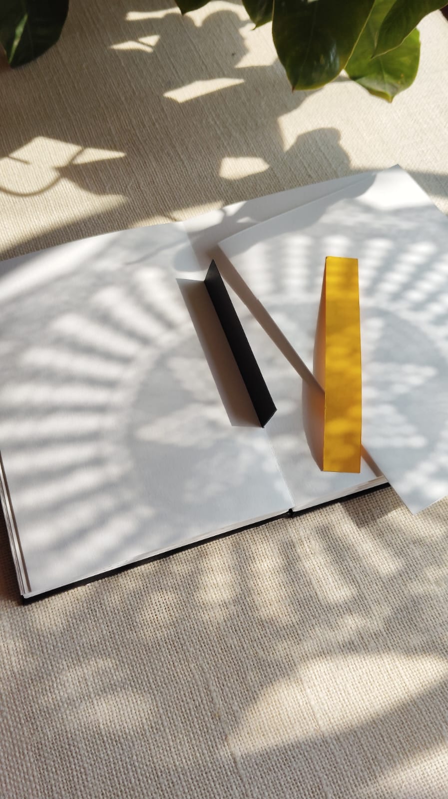 Japanese stab binding noble four-hole pattern shown on an open notebook