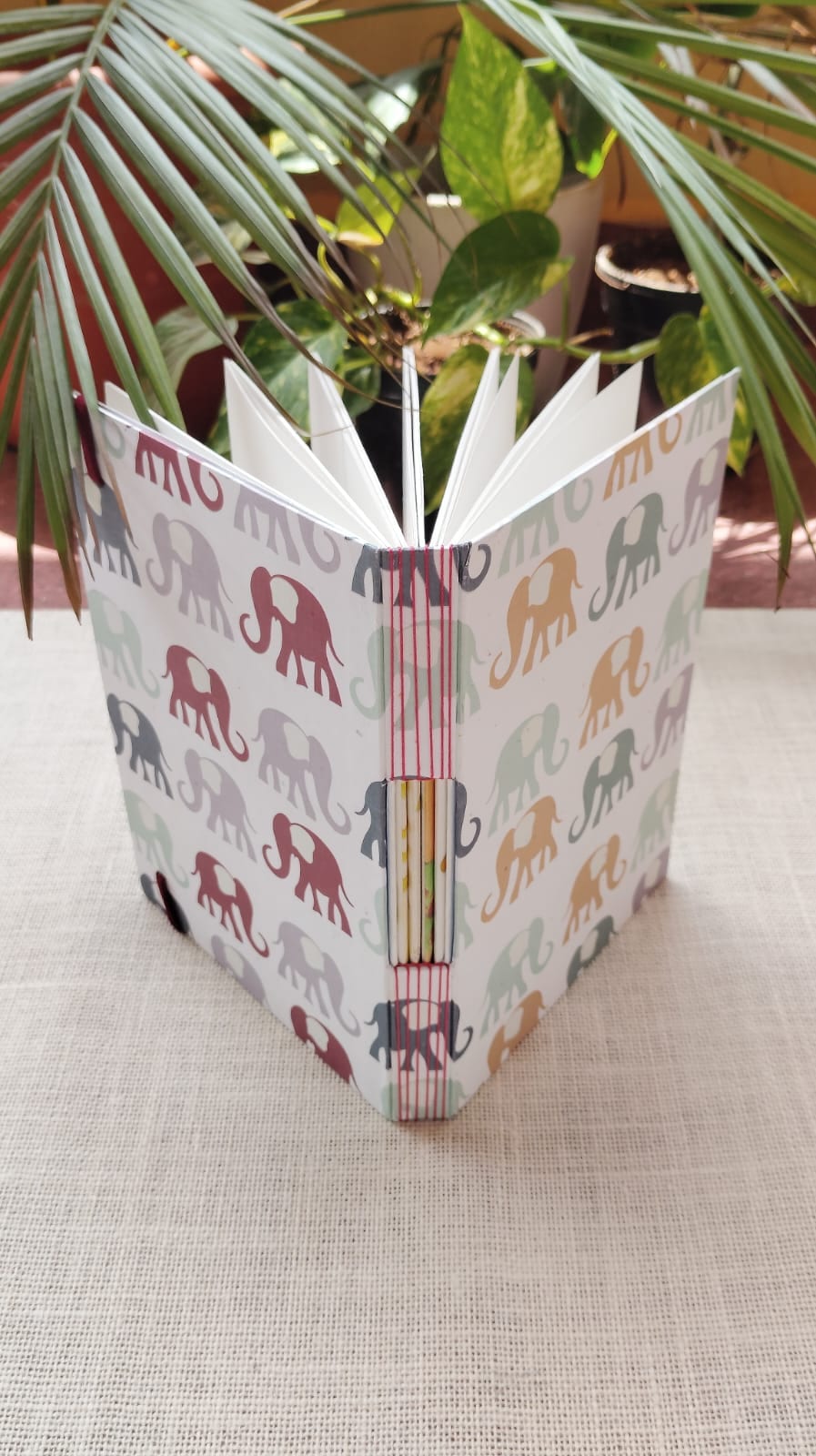 Pack of three Japanese stab-bound A6 zines on recycled kraft paper