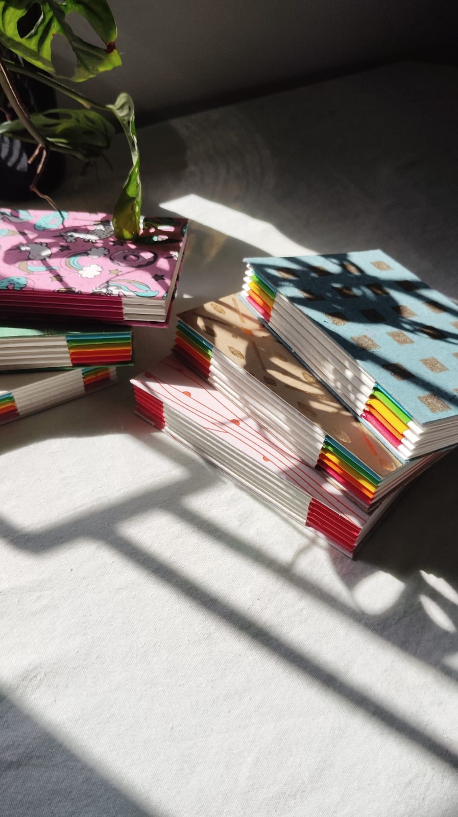 Secret Belgian cross-weave binding detail in waxed-linen thread on handmade paper