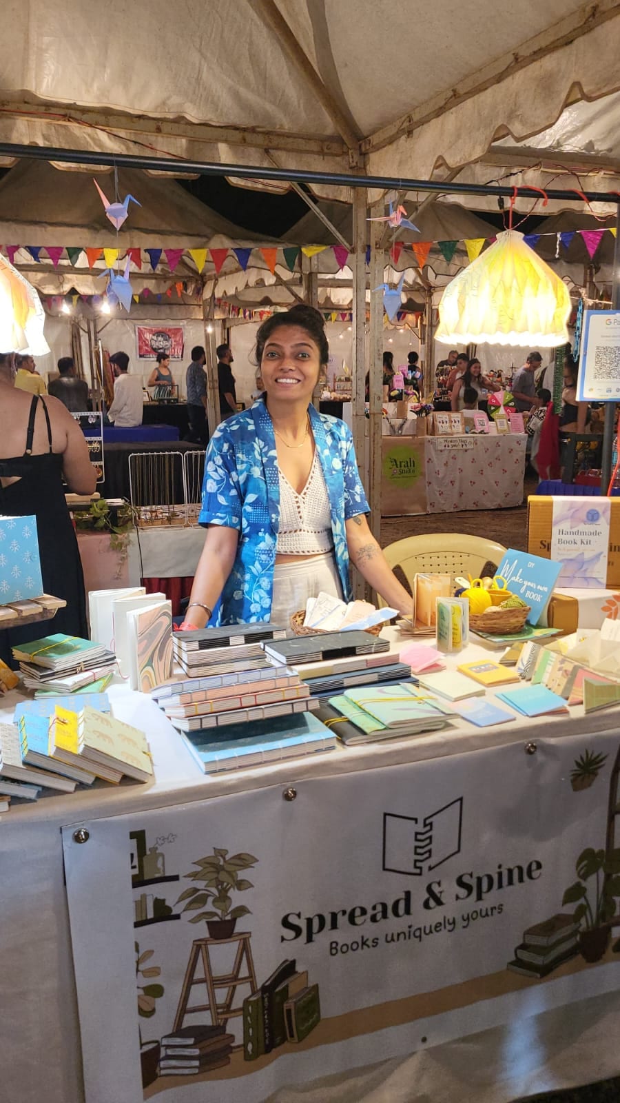 Corporate teams collaborating at a hands-on bookbinding workshop in India