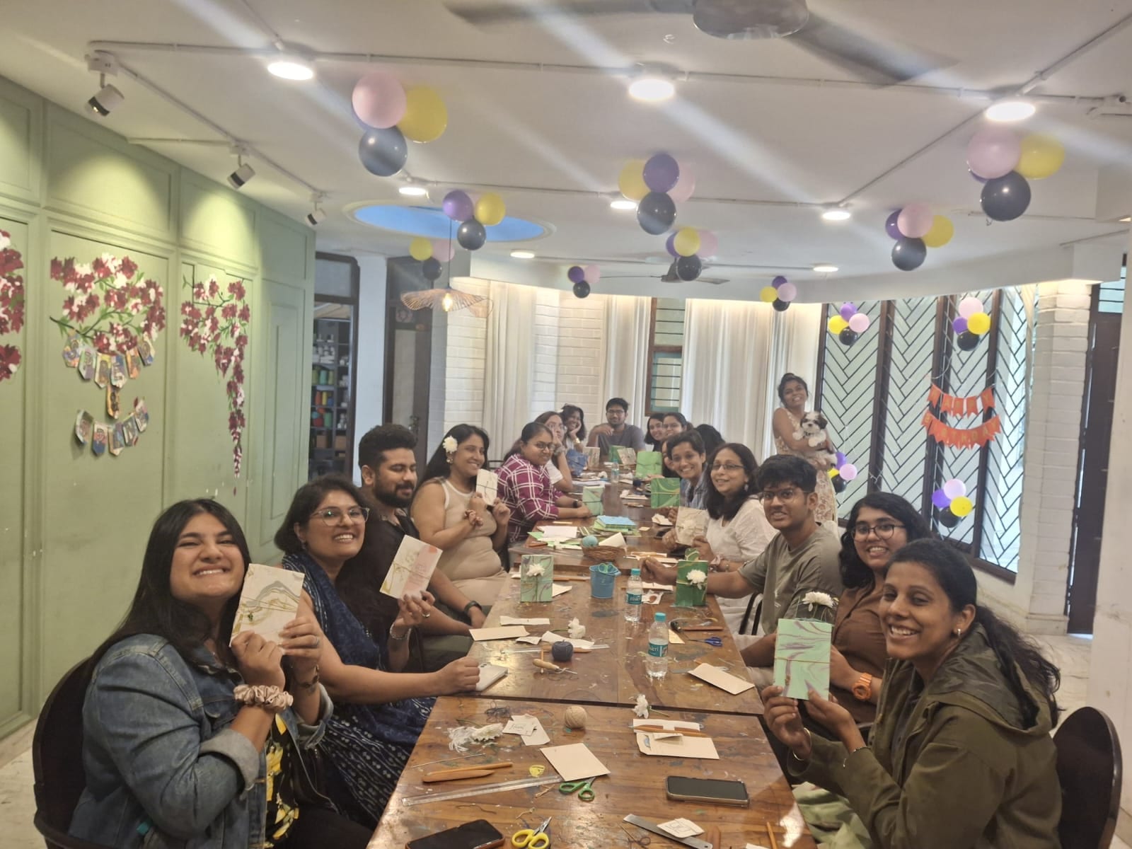Workshop participants stitching Coptic bindings using waxed-linen thread