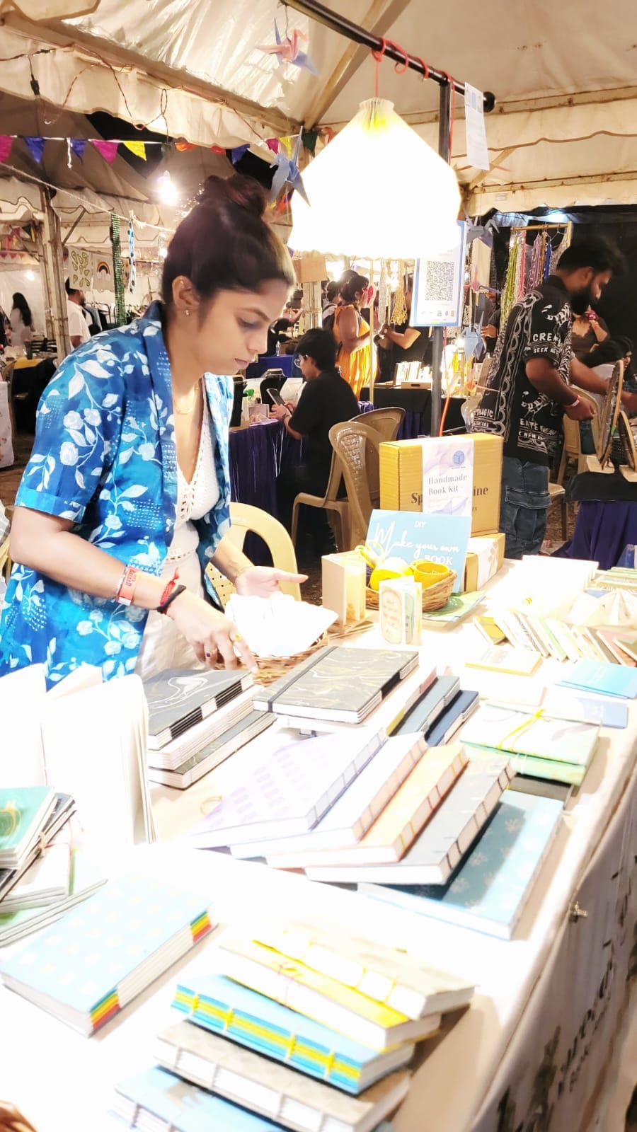 Finished Coptic-bound journals from a Spread & Spine bookbinding workshop